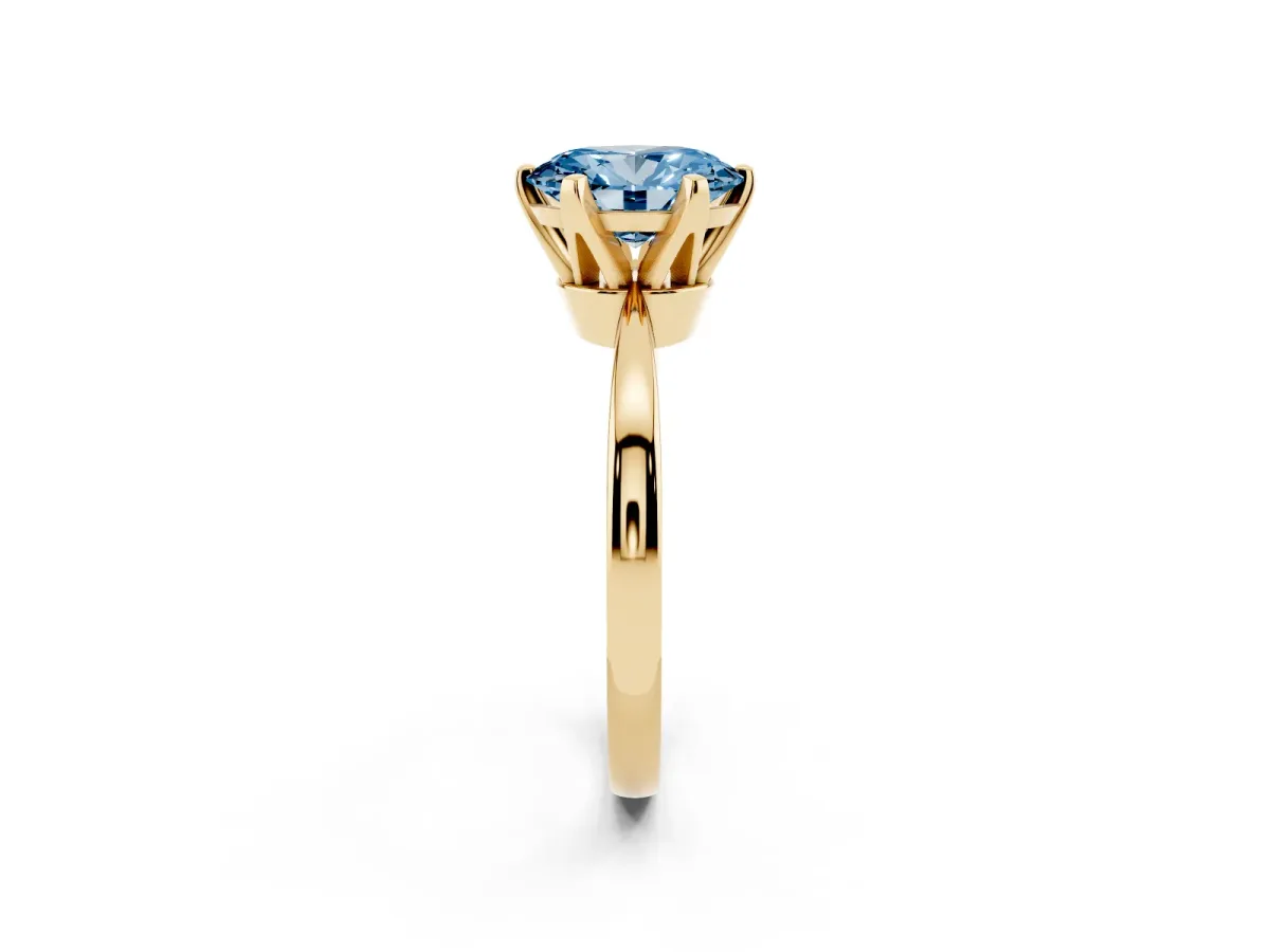 Fancy Blue Oval Cut Solitaire Engagement Ring with Six-Prong Setting and Tapered Band Yellow gold