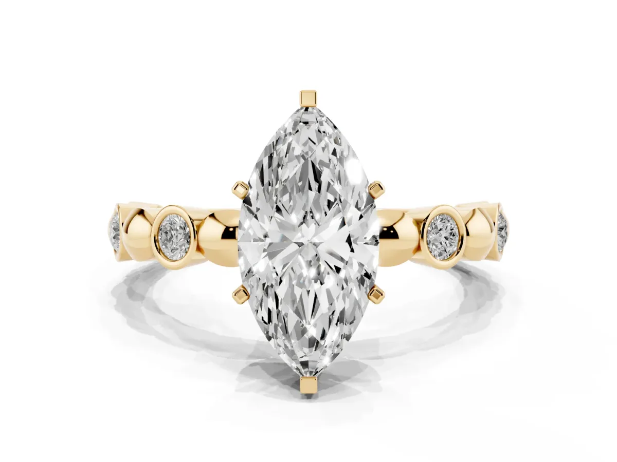 Marquise Cut Solitaire Bezel-Set Diamond Ring with Beaded Band and Four-Prong Setting Yellow gold