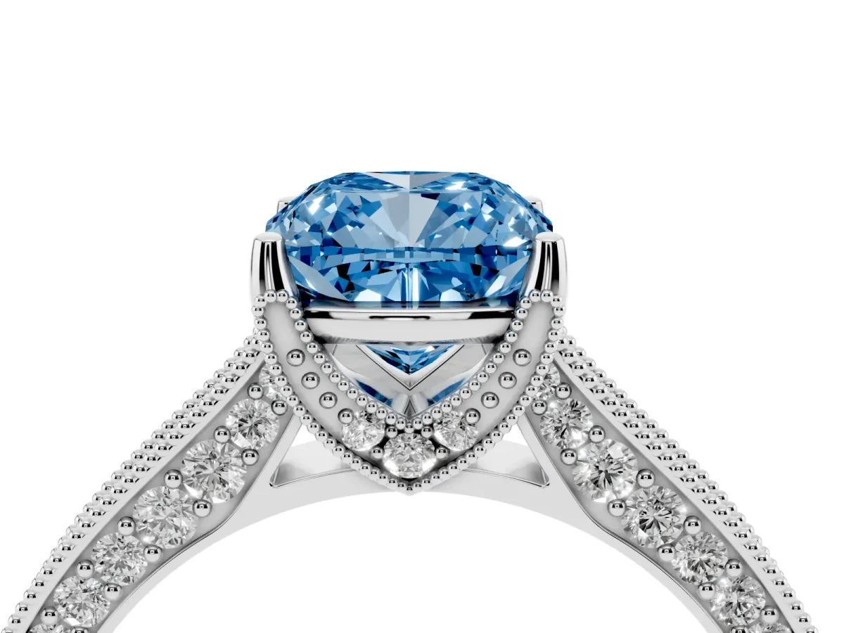 Fancy Blue Cushion Cut Cut Diamond Solitaire Ring with Milgrain Pave Band and Four Prong Setting Silver