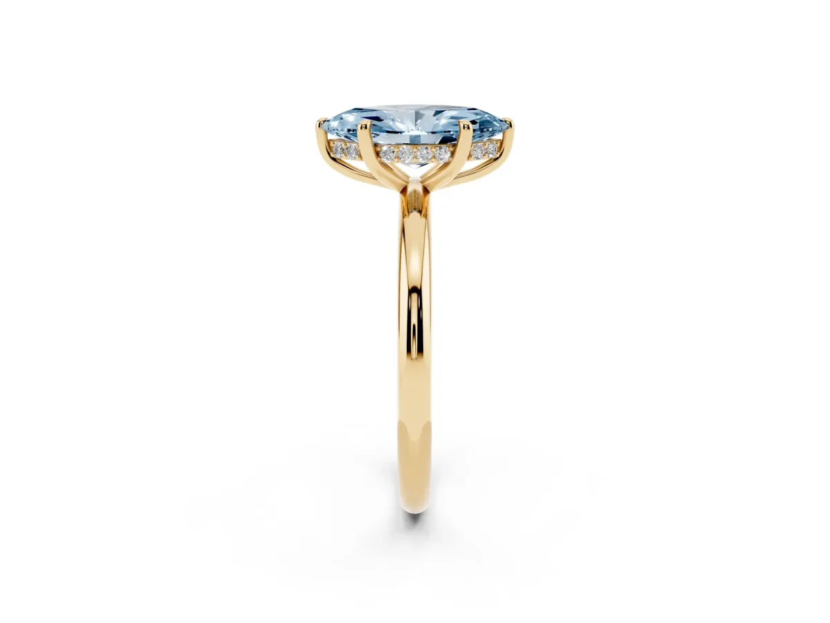 Fancy Blue Marquise Cut Diamond Solitaire Ring with Thin Band and Four-Prong Setting Yellow gold