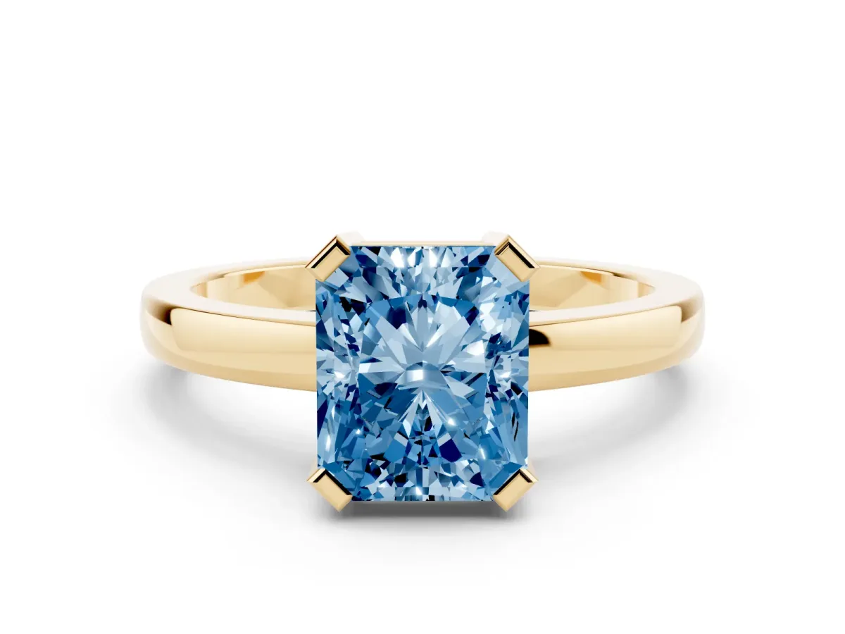 Fancy Blue Radiant Cut Cut Solitaire Ring with Four-Prong Setting and Classic Band Yellow gold
