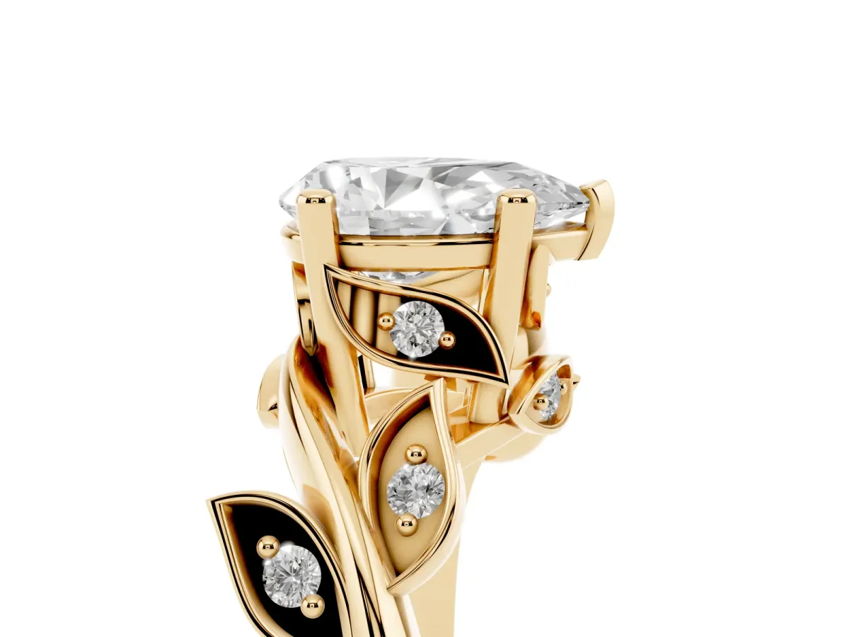Pear Cut Solitaire Twist Engagement Ring with Leaf Accents and Prong Setting Yellow gold