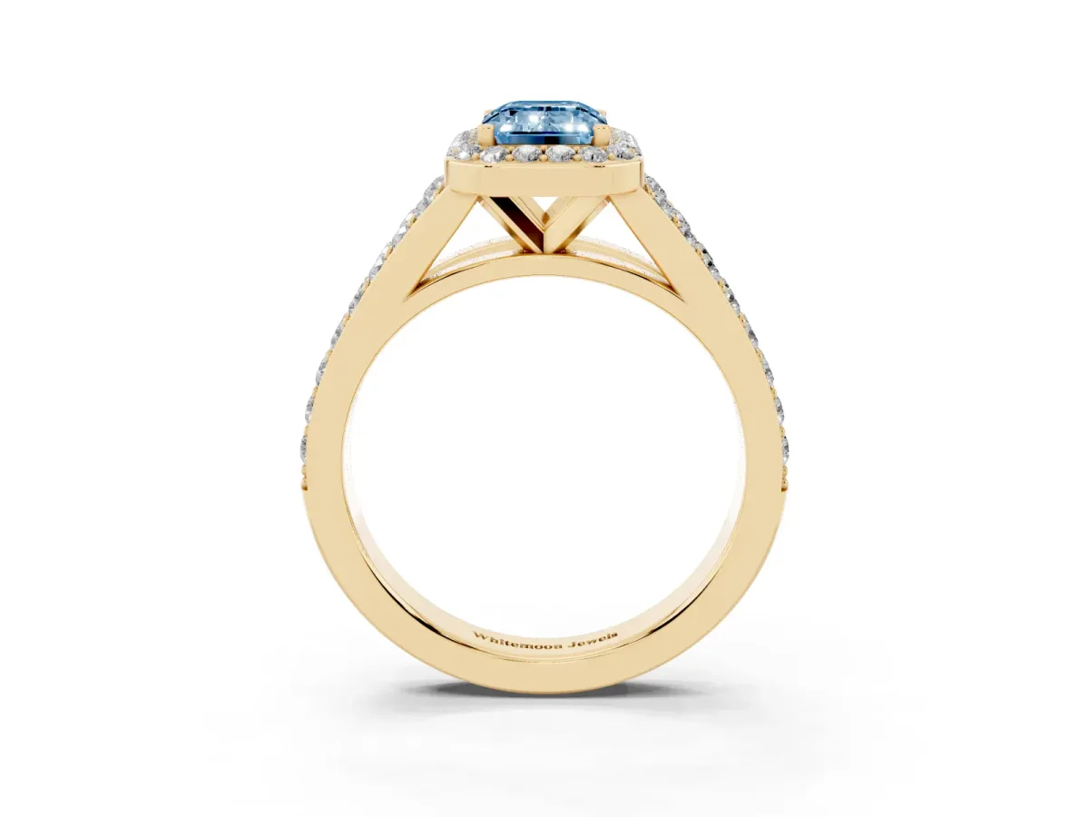 Fancy Blue Emerald Cut Diamond Split Shank Halo Ring with Four-Prong Setting Yellow gold