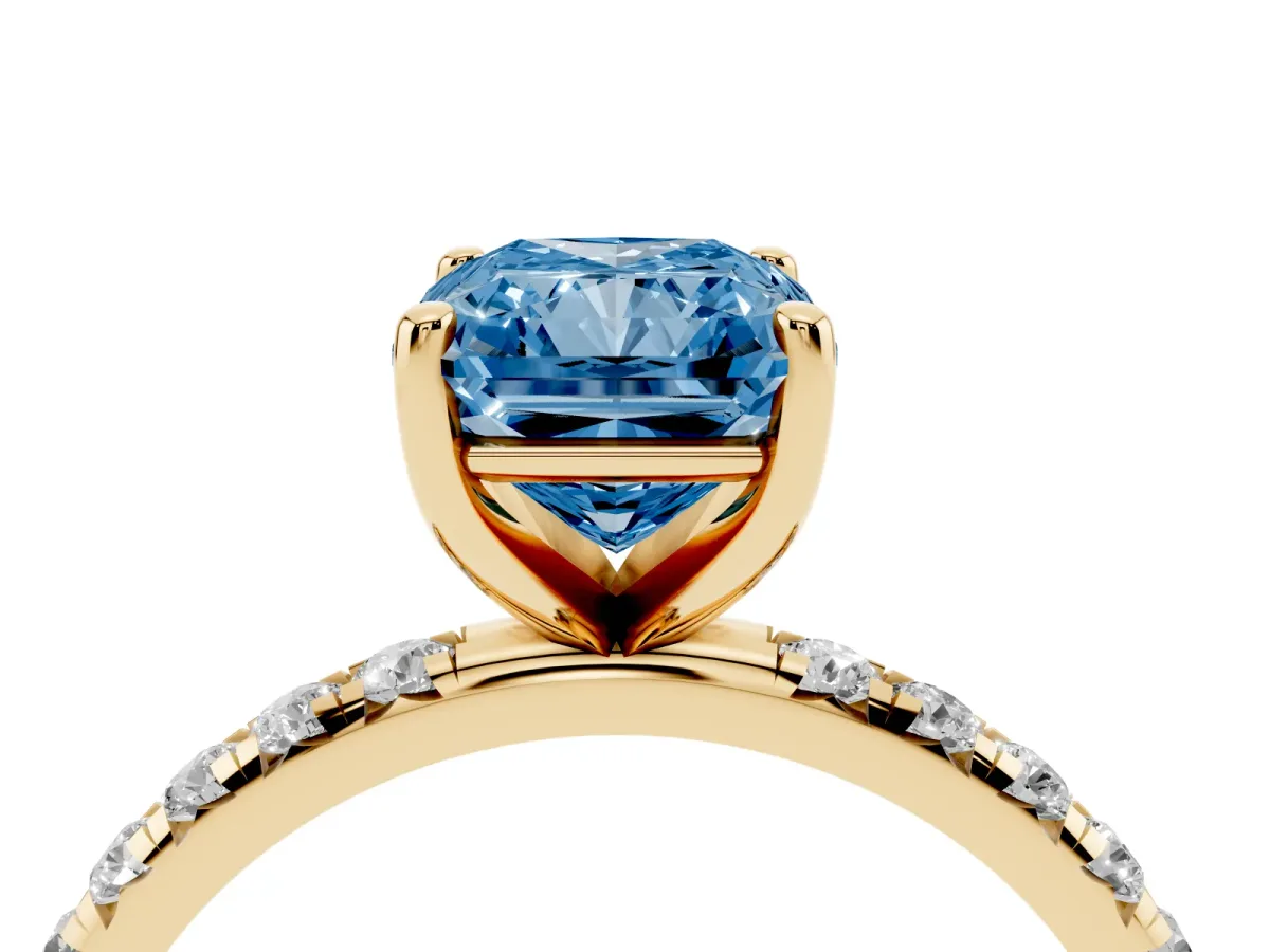 Fancy Blue Radiant Cut Cut Diamond Solitaire Ring with Micro Pave Band and Four Prong Setting Yellow gold