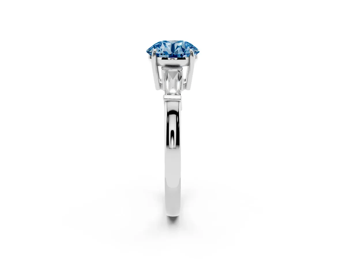 Fancy Blue Round Cut Diamond Three-Stone Ring with Tapered Baguette Side Stones and Prong Setting Silver