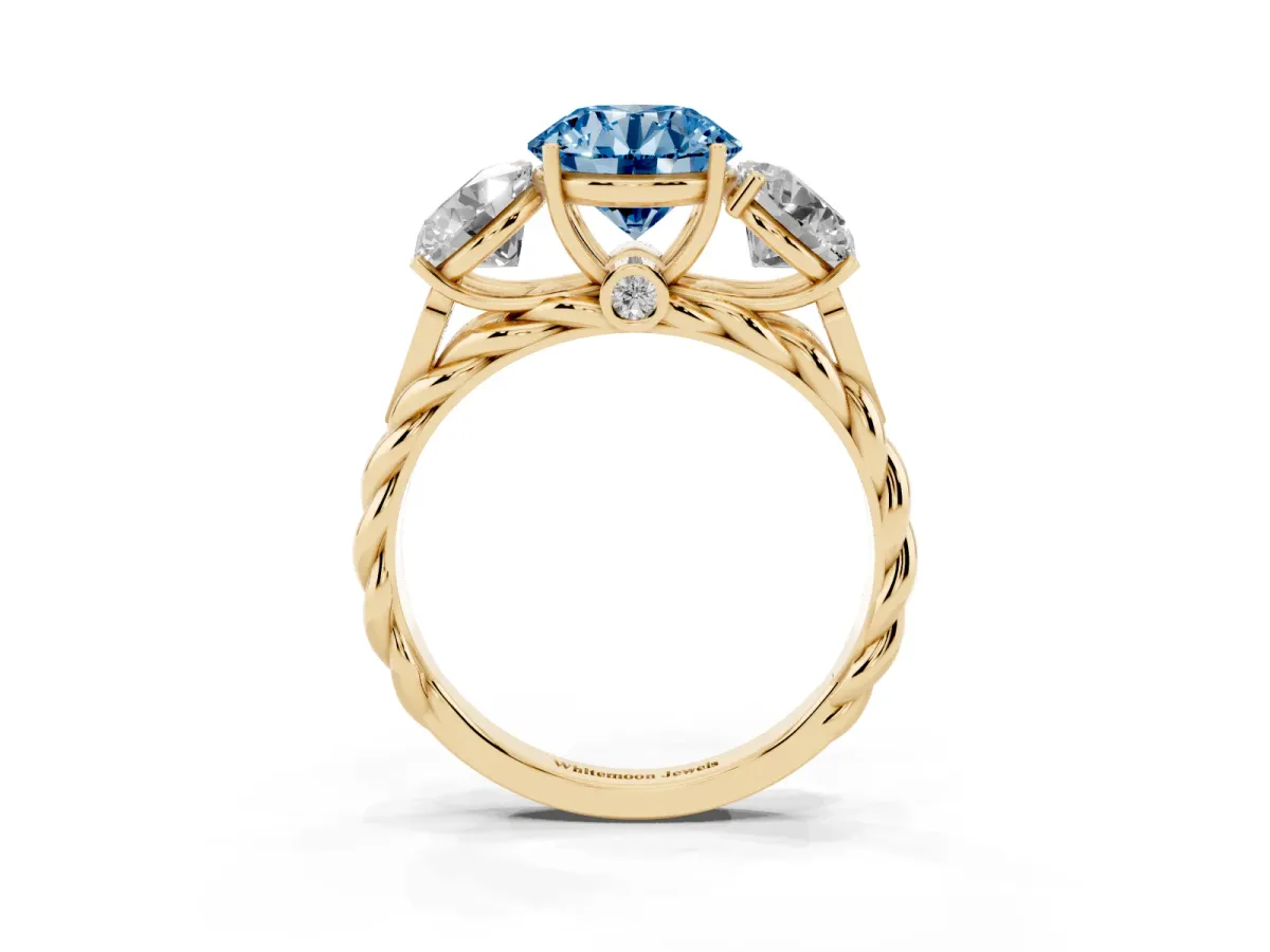 Fancy Blue Three-Stone Round Cut Diamond Braided Band Ring with Four-Prong Setting Yellow gold