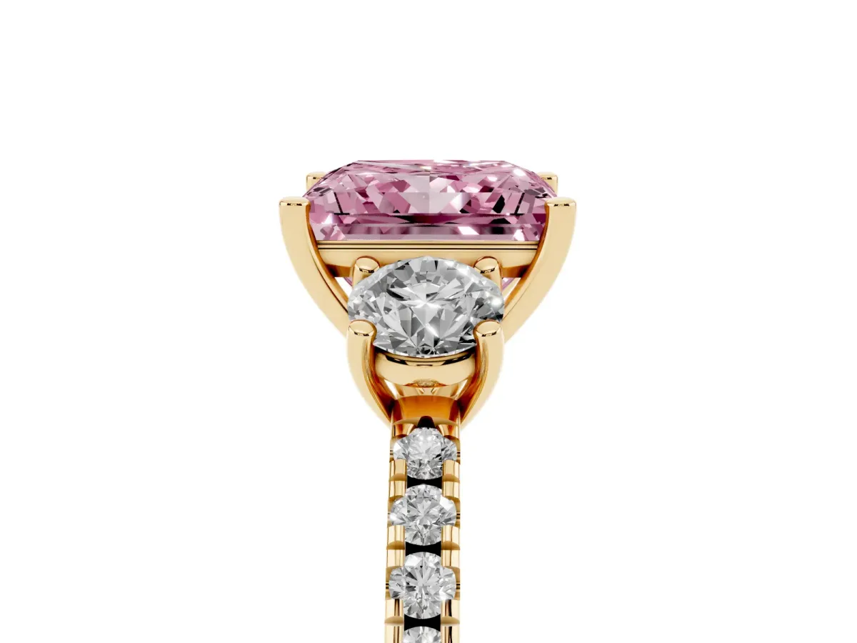 Fancy Pink Three-Stone Princess Cut Cut Diamond Pavé Band with Prong Setting Yellow gold