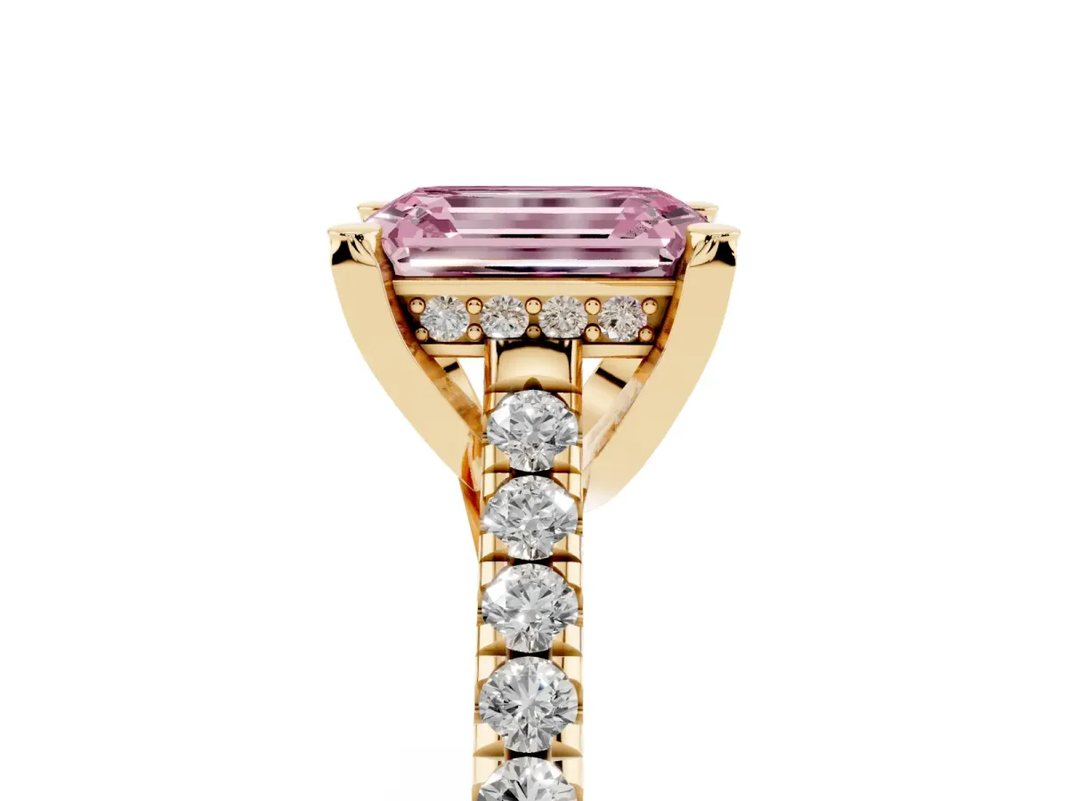 Fancy Pink Emerald Cut Brilliant Diamond Solitaire with Pavé Band and Four-Prong Setting Yellow gold