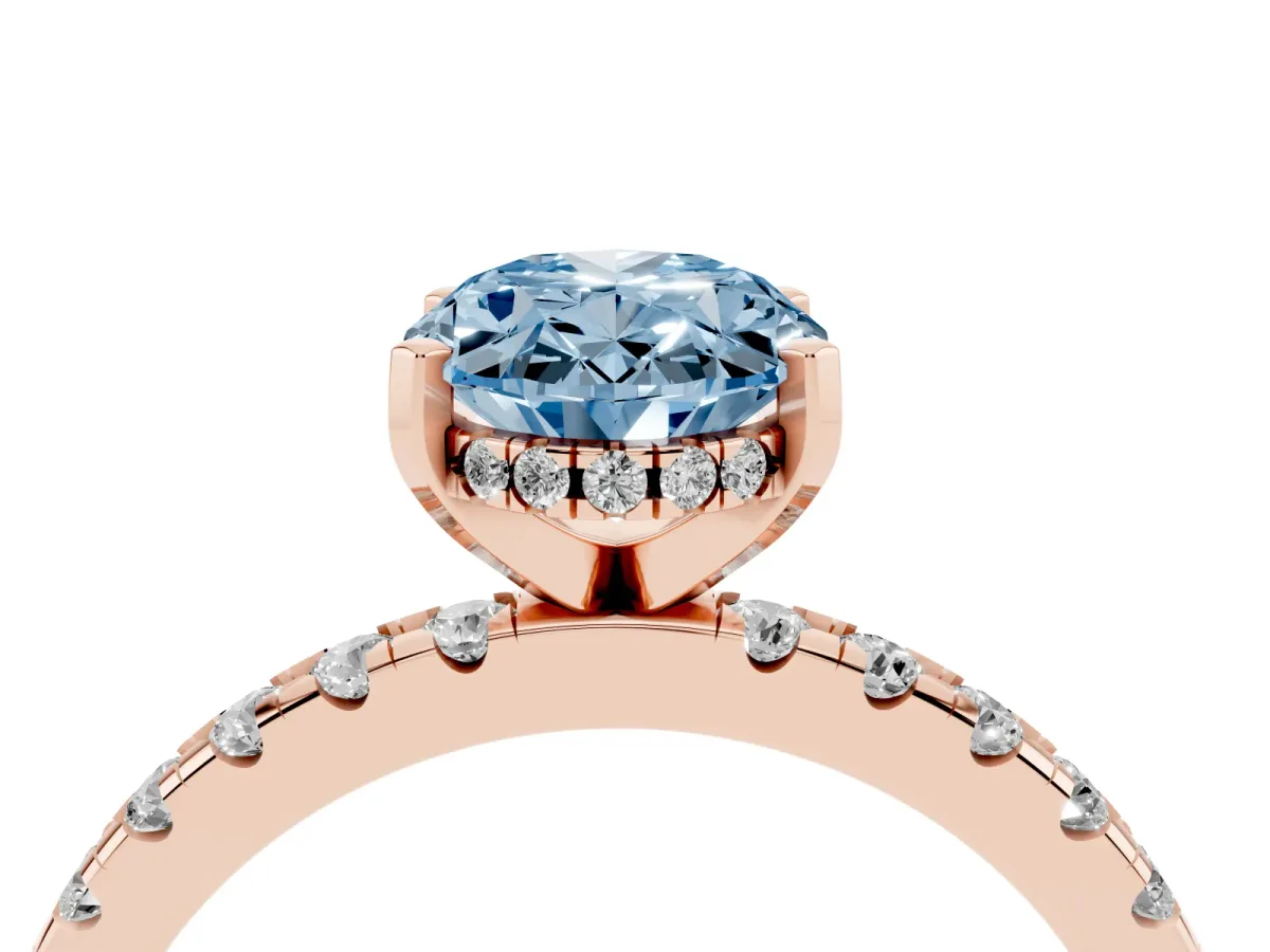 Fancy Blue Oval Cut Diamond Solitaire Ring with Round Pavé Band and Four-Prong Setting Rose gold