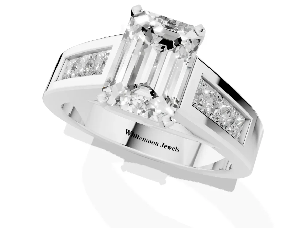 Emerald Cut Cut Channel Set Solitaire Ring with Four-Prong Setting Silver