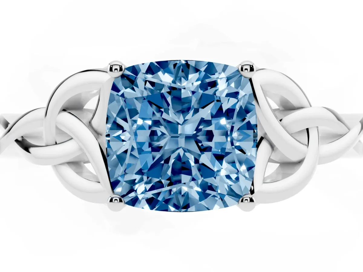Fancy Blue Cushion Cut Diamond Solitaire Engagement Ring with Celtic Knot Band and Four-Prong Setting Silver