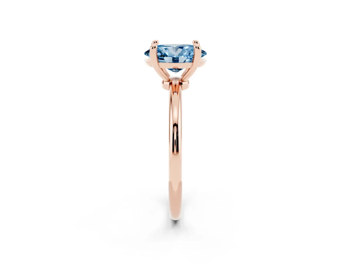 Fancy Blue Oval Cut Solitaire Diamond Ring with 4-Prong Setting on a Classic Band Rose gold
