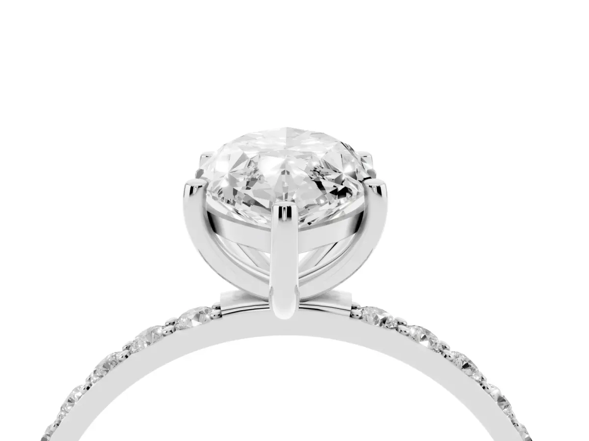 Marquise Cut Diamond Solitaire Ring with Round Pavé Shoulders and Prong Setting Silver