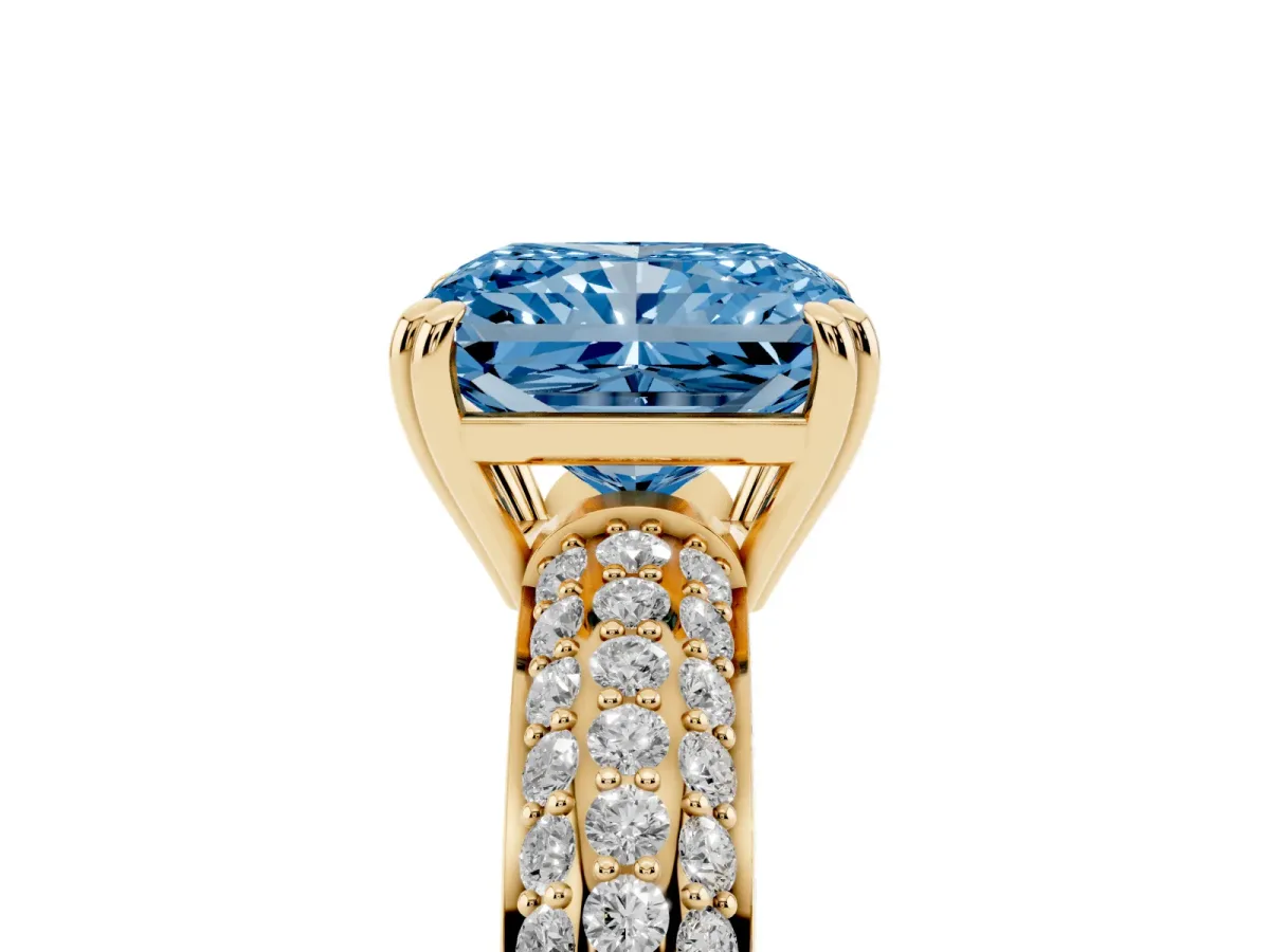 Fancy Blue Radiant Cut Diamond Solitaire Ring with Multi-Row Round Pavé Band and Prong Setting Yellow gold
