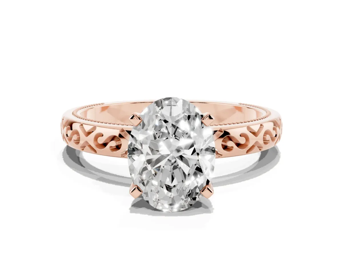 Oval Cut Solitaire Engagement Ring with Scrollwork Band and Four-Prong Setting Rose gold