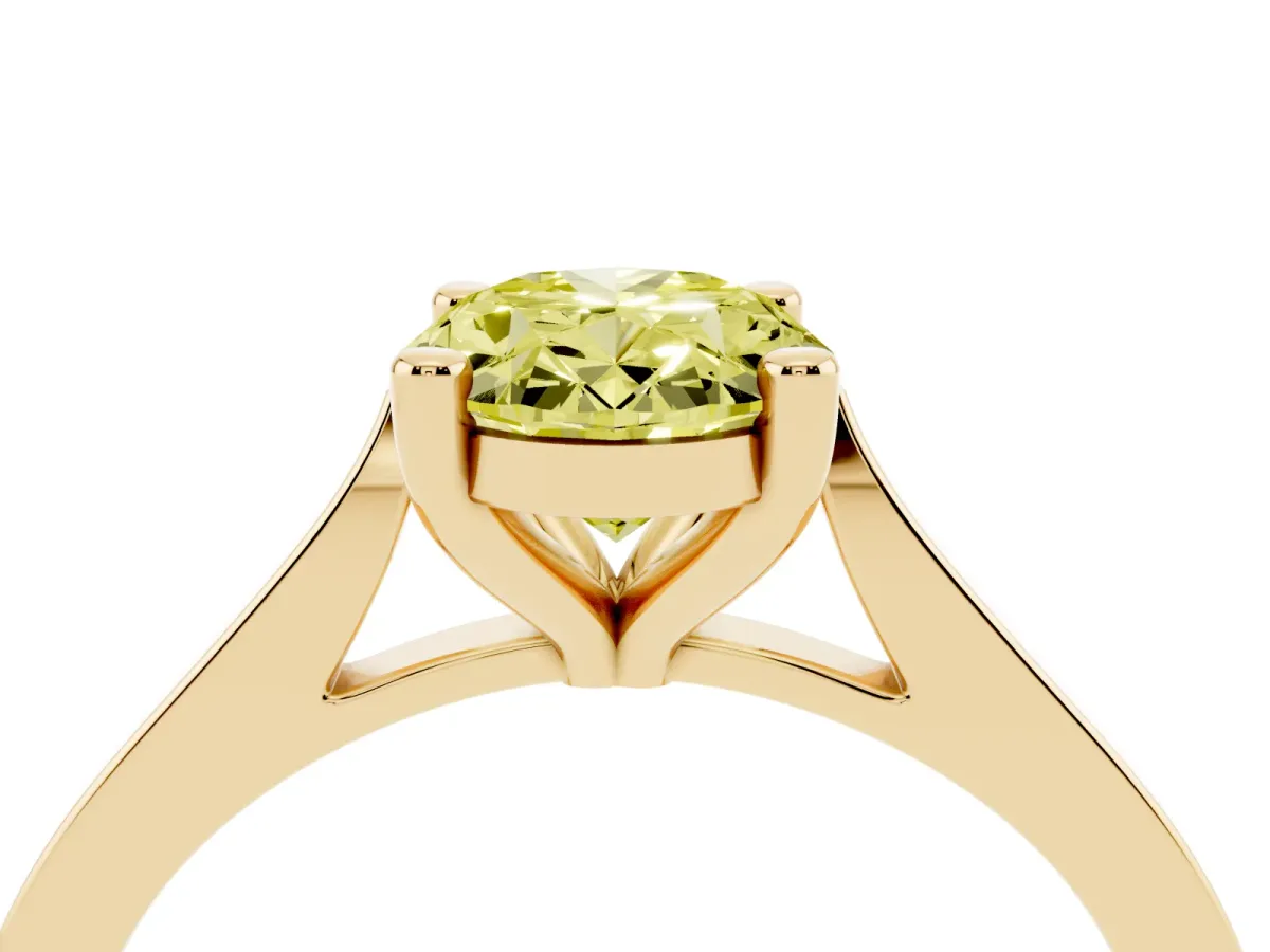 Fancy Yellow Oval Cut Solitaire Diamond Ring with Four-Prong Setting and Tapered Band Yellow gold