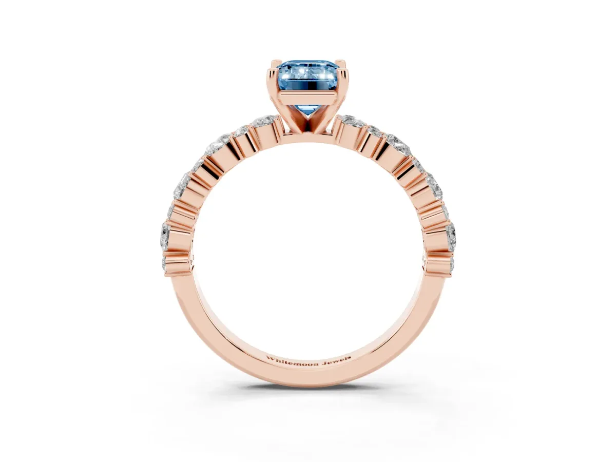 Fancy Blue Emerald Cut Diamond Side Stone Solitaire Ring with Round and Four-Prong Setting Rose gold