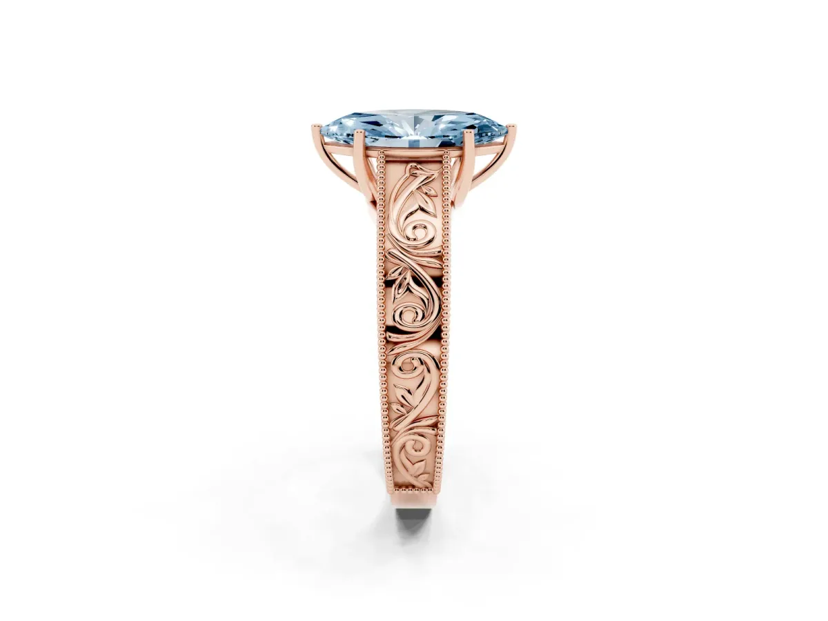 Fancy Blue Marquise Cut Diamond Solitaire Ring with Engraved Band and Four-Prong Setting Rose gold