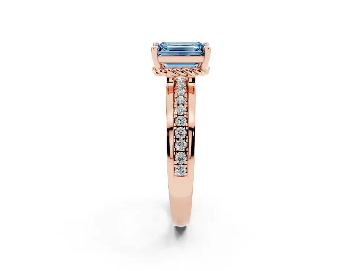 Fancy Blue Emerald Cut Solitaire Diamond Ring with Channel Set Band and Six-Prong Setting Rose gold