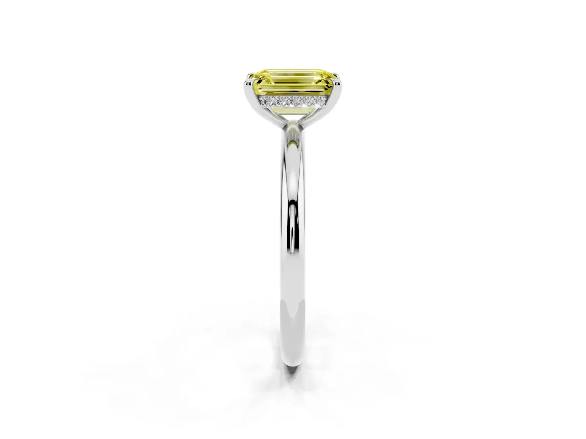 Fancy Yellow Emerald Cut Diamond Solitaire Ring with Thin Band and Four-Prong Setting Silver