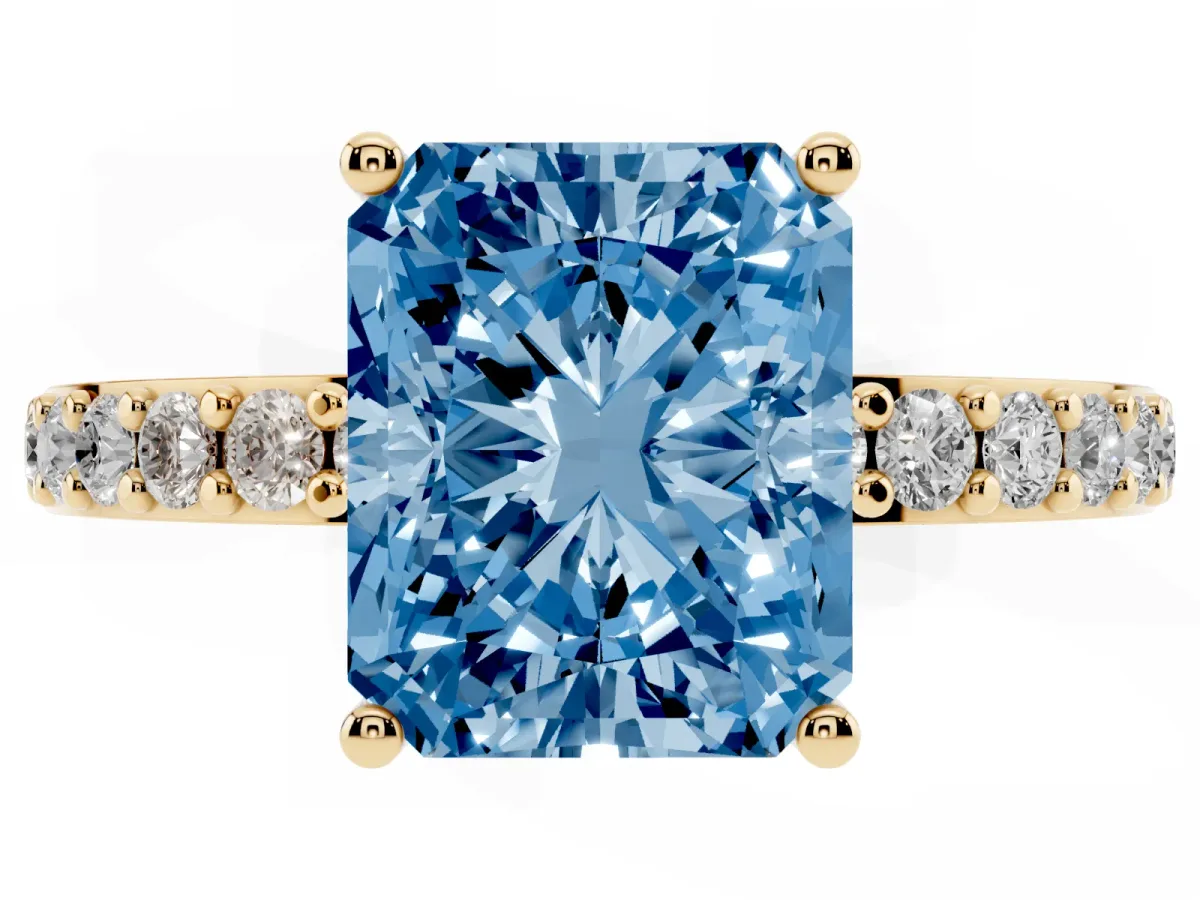 Fancy Blue Radiant Cut Cut Diamond Solitaire with Pave Band and Four-Prong Setting Yellow gold
