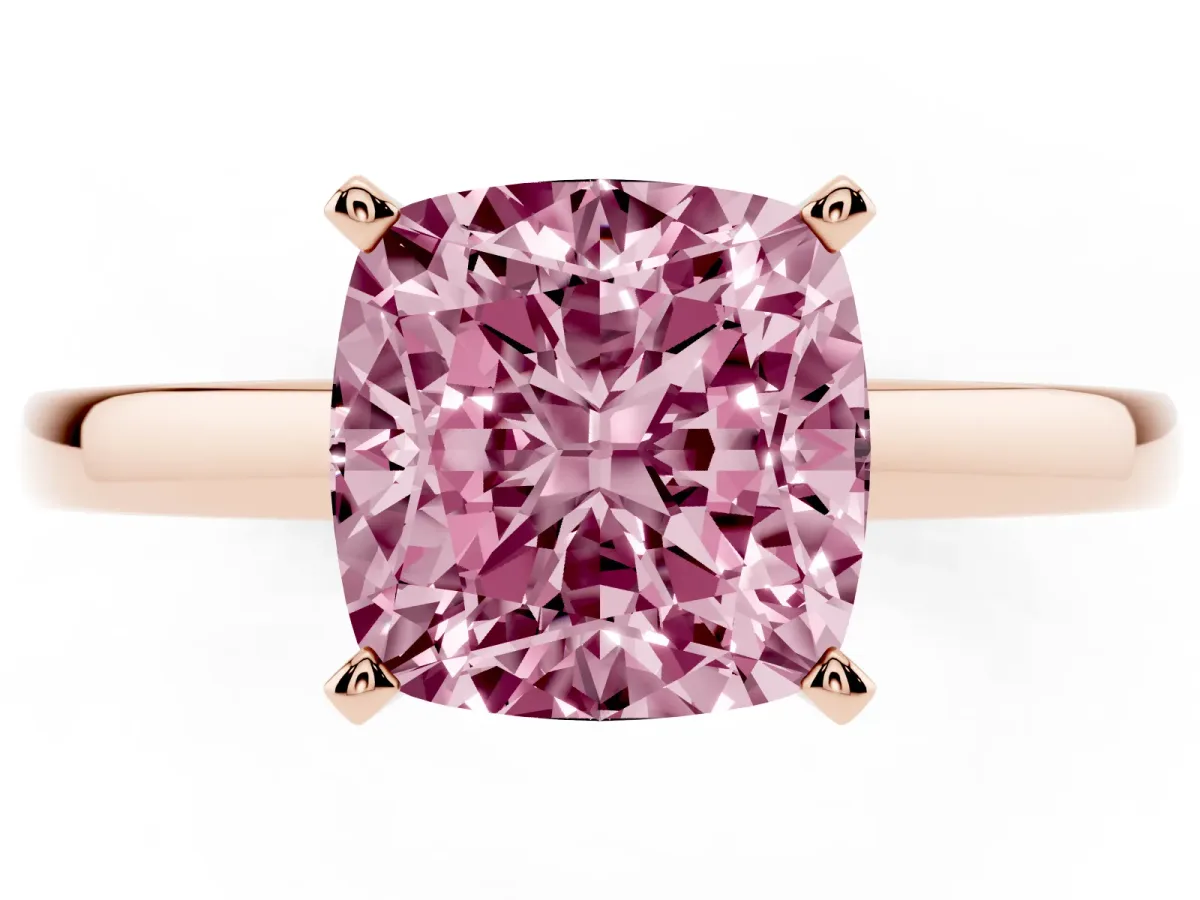 Fancy Pink Cushion Cut Solitaire Diamond Engagement Ring with Four-Prong Setting on a Classic Band Rose gold