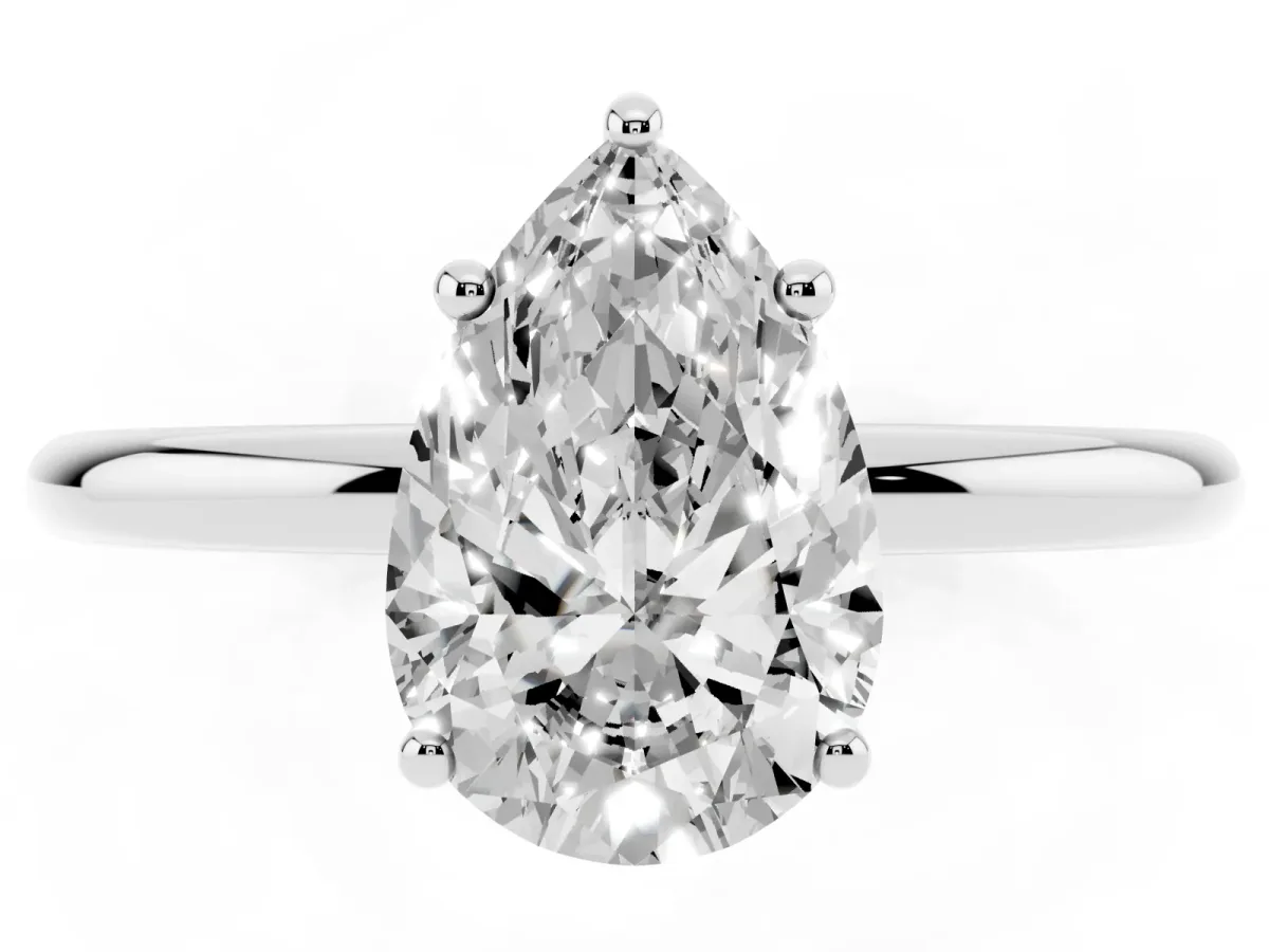Pear Cut Solitaire Diamond Ring with a Classic Band and Four-Prong Setting Platinum