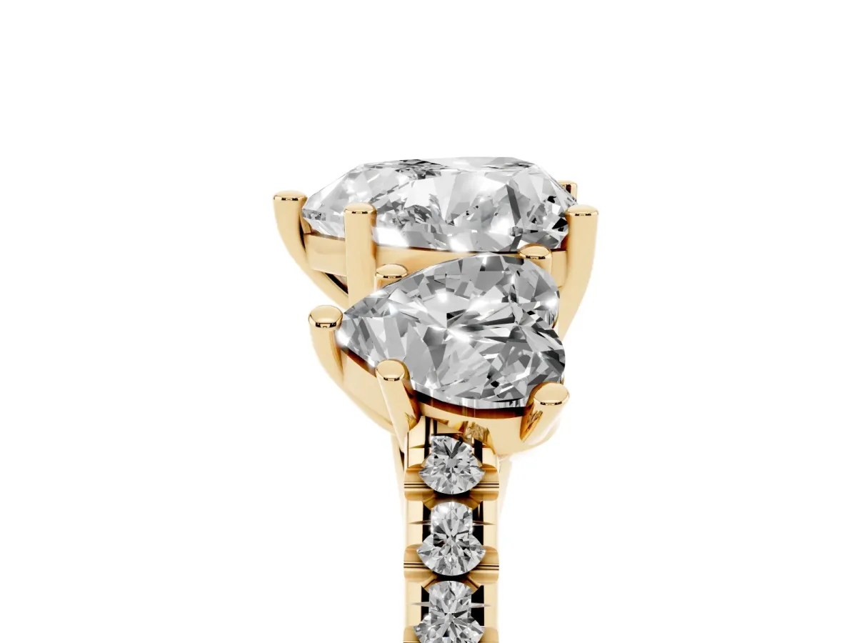 Three-Stone Heart Cut Diamond Ring with Round Pavé Band and Prong Setting Yellow gold