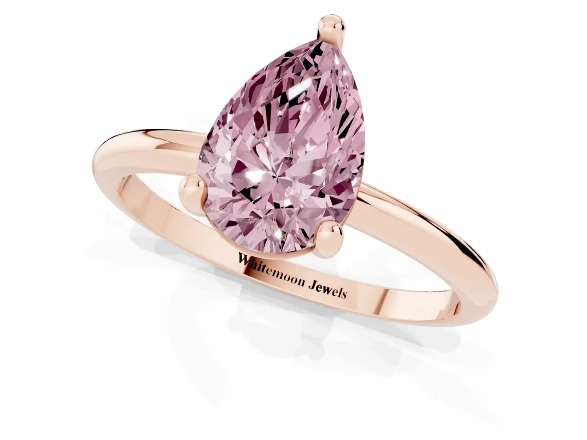 Fancy Pink Pear Cut Solitaire Diamond Ring with 4-Prong Setting on a Classic Band Rose gold