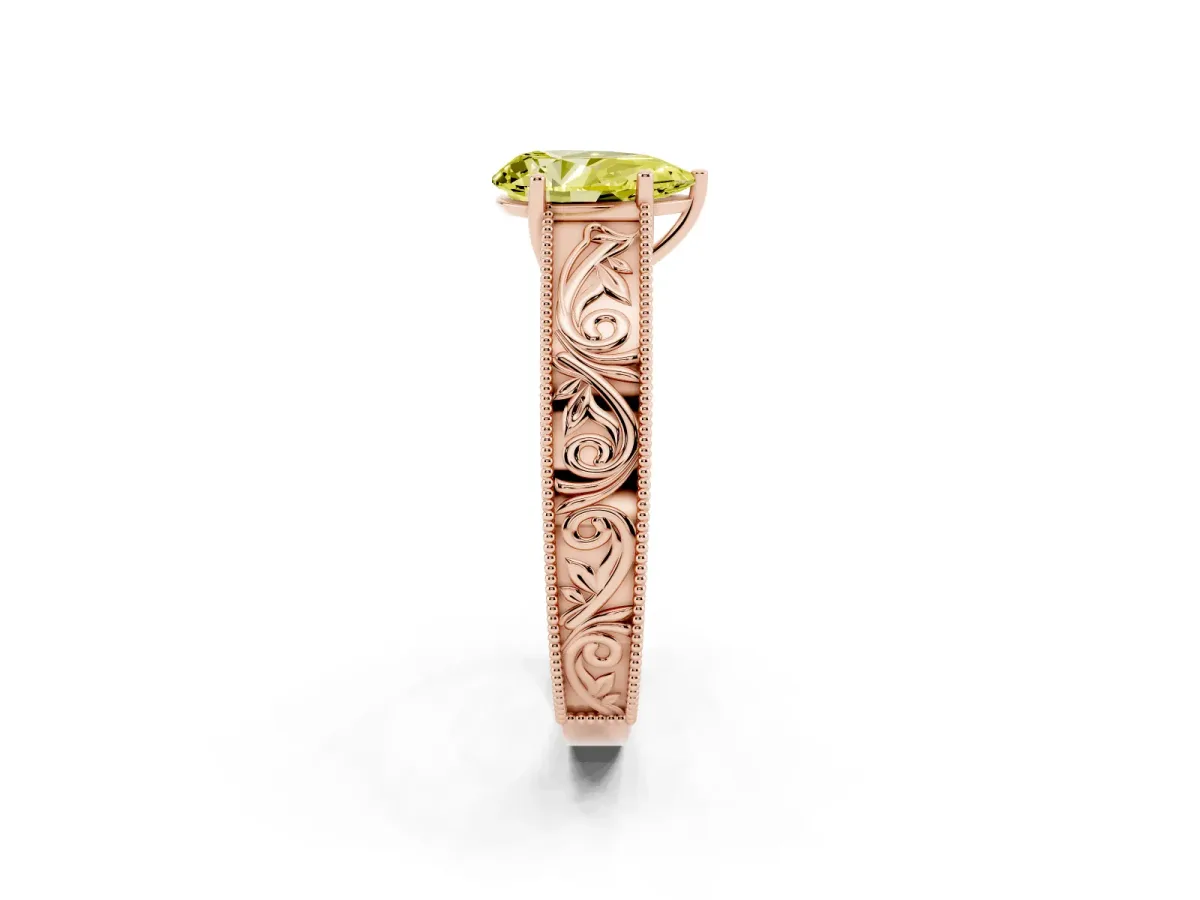 Fancy Yellow Pear Cut Diamond Solitaire Ring with Engraved Band and Four-Prong Setting Rose gold