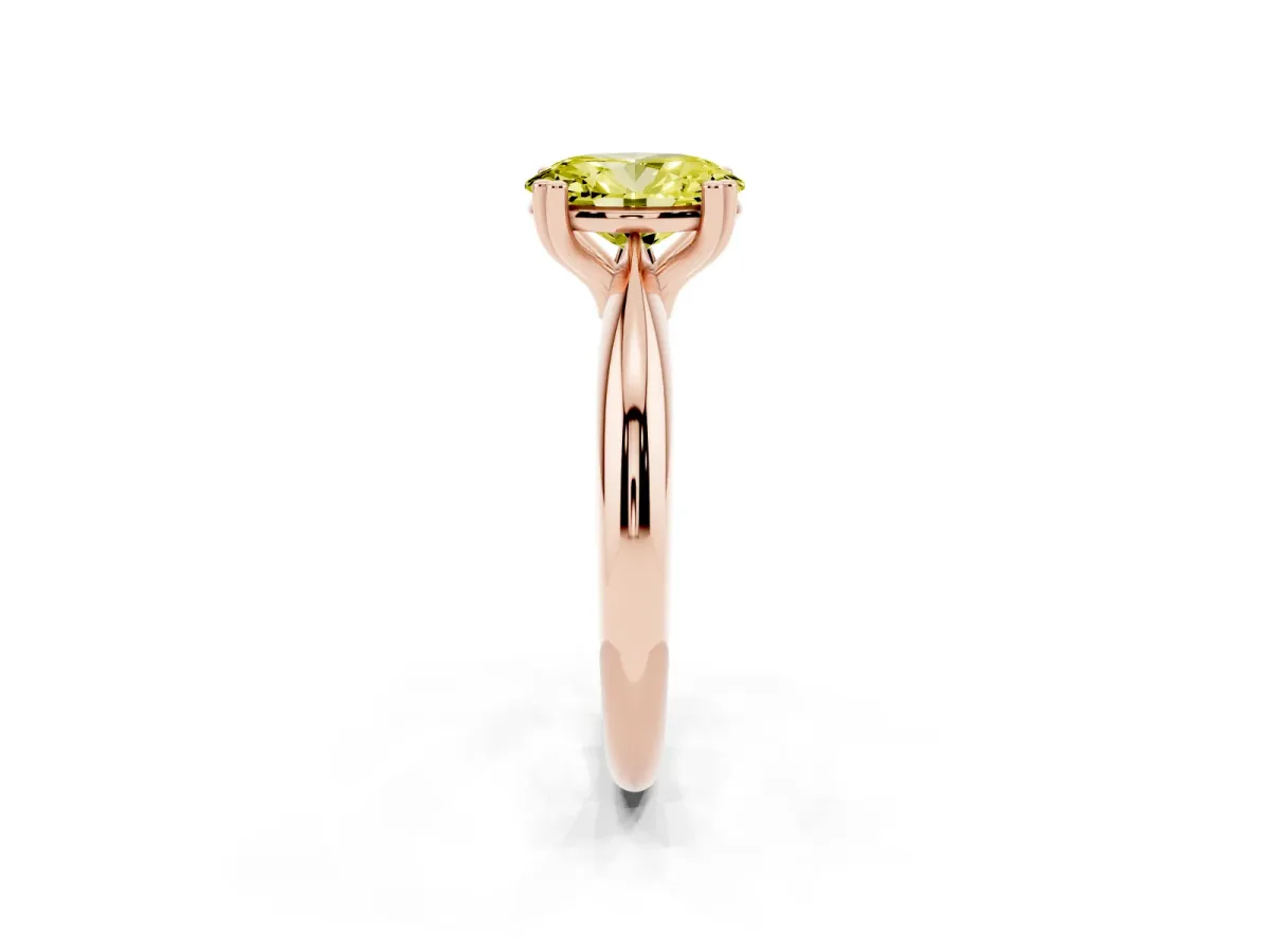 Fancy Yellow Oval Cut Cut Solitaire Engagement Ring with Tapered Band and Four-Prong Setting Rose gold