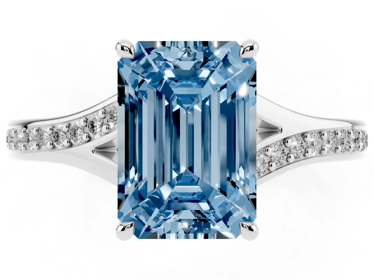 Fancy Blue Emerald Cut Diamond Solitaire Ring with Pavé Band and Prong Setting Platinum