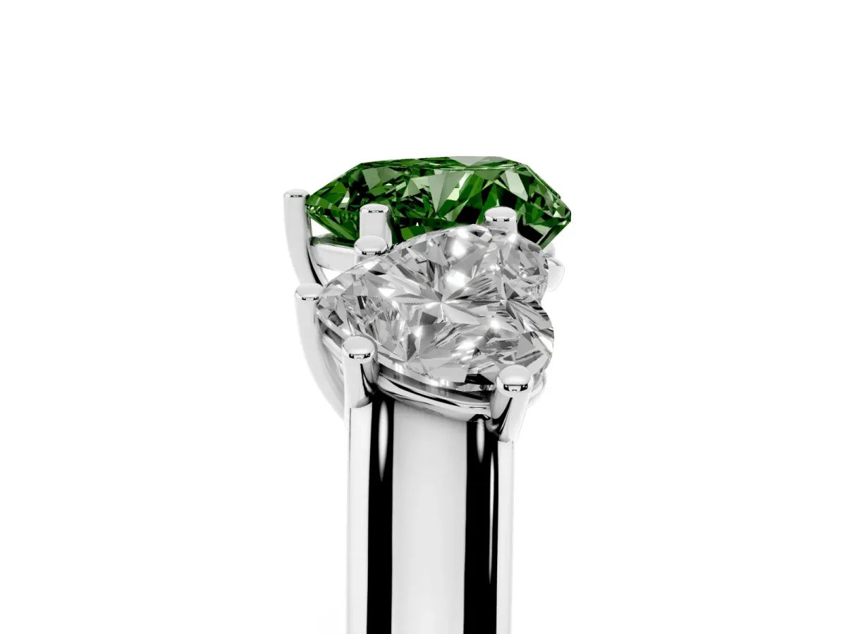 Fancy Green Heart Cut Three-Stone Diamond Ring with Prong Setting on a Classic Band Silver