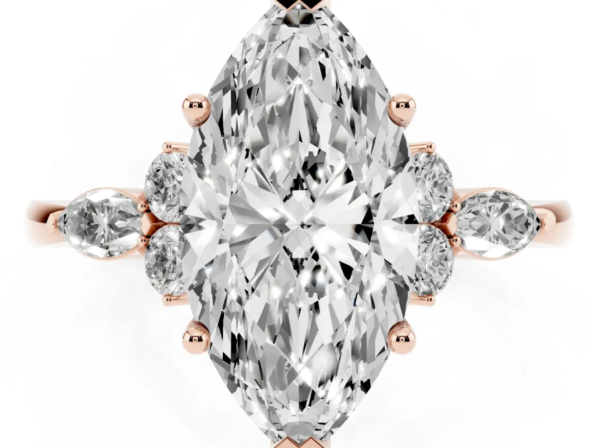 Marquise Cut Brilliant Diamond Solitaire Ring with Pear Side Stones and Four-Prong Setting Rose gold