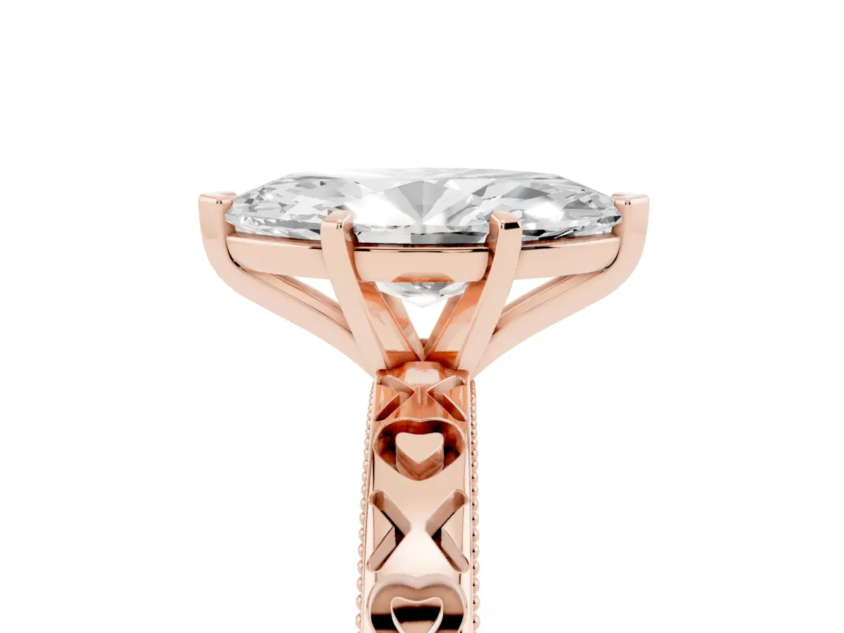 Marquise Cut Solitaire Diamond Engagement Ring with XO Engraved Band and Four-Prong Setting Rose gold