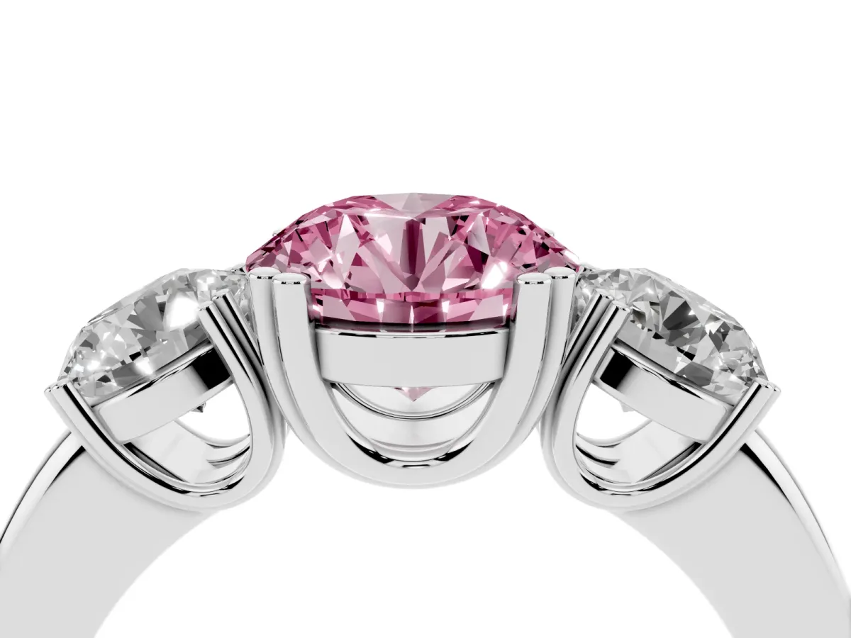 Fancy Pink Three-Stone Round Cut Cut Diamond Ring with Channel Set Band and Four-Prong Setting Silver