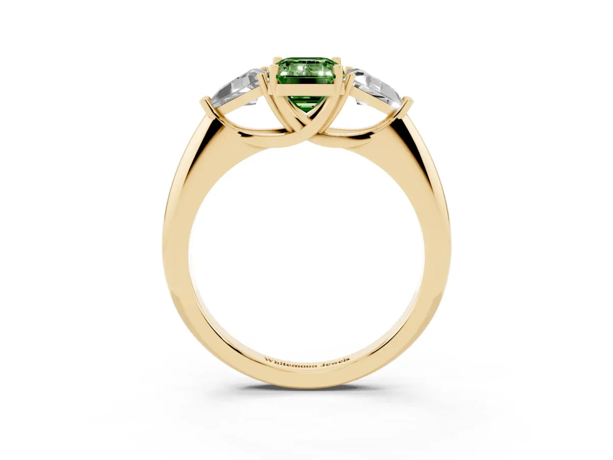 Fancy Green Three-Stone Emerald Cut Diamond Engagement Ring with Trillion Side Stones and Prong Setting Yellow gold