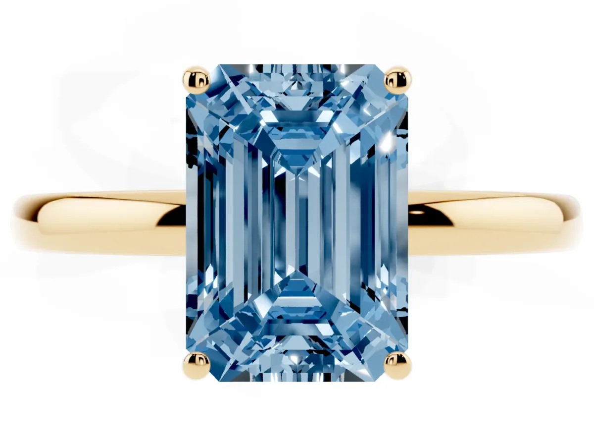 Fancy Blue Emerald Cut Solitaire Diamond Ring with Prong Setting and Plain Band Yellow gold