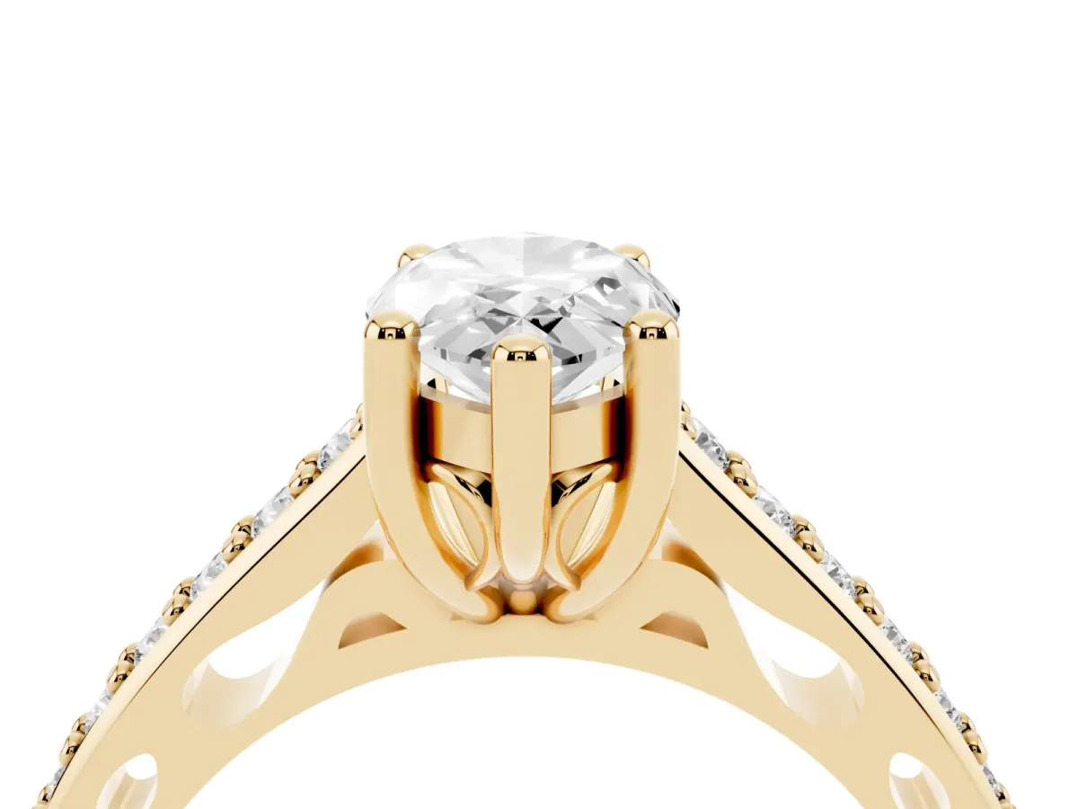 Marquise Cut Solitaire Prong Set Diamond Engagement Ring with Pave Band Yellow gold