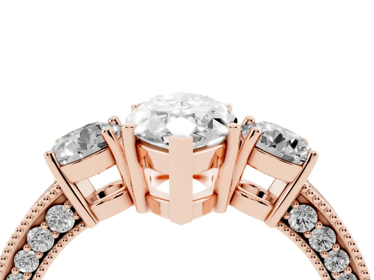 Marquise Cut Three-Stone Diamond Ring with Pavé Band and Four-Prong Setting Rose gold