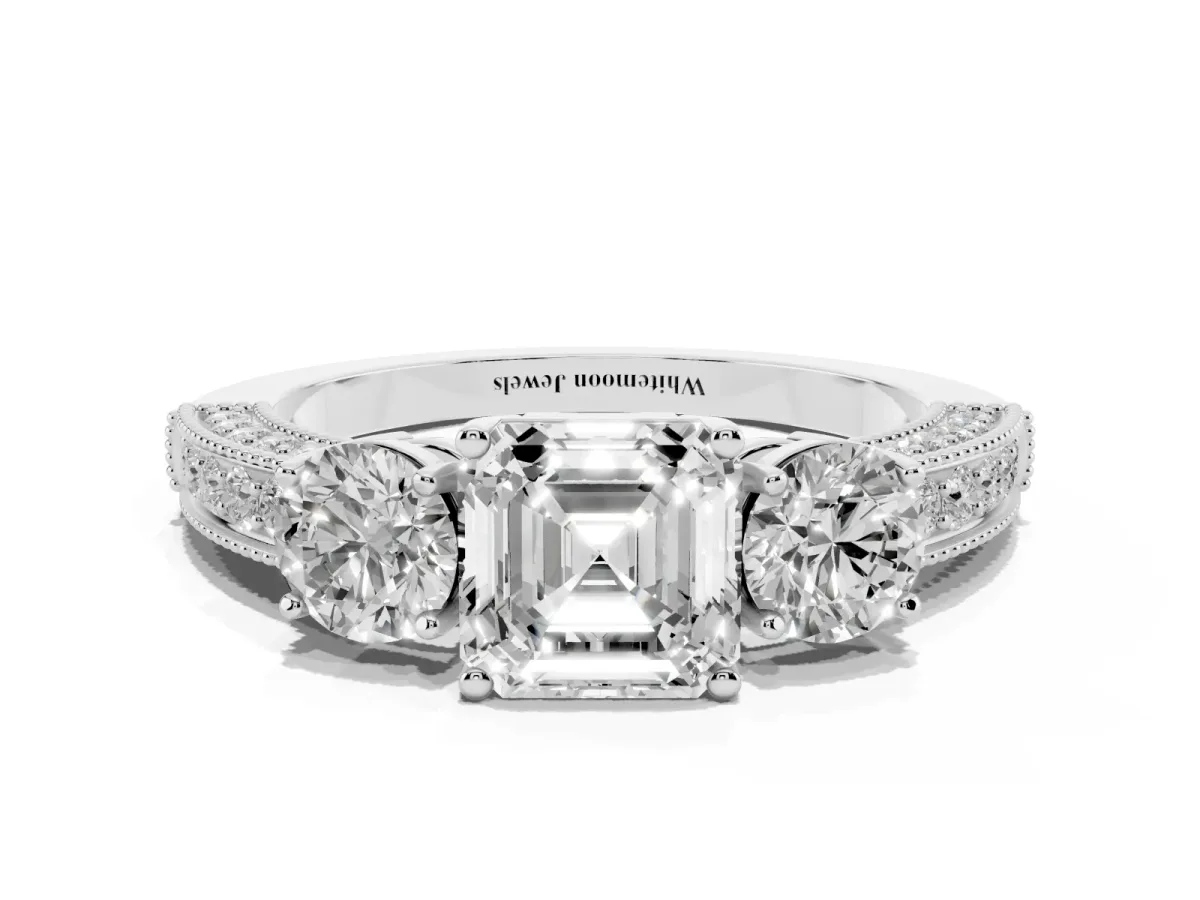 Asscher Cut Three-Stone Diamond Ring with Pavé Band and Four-Prong Setting Platinum