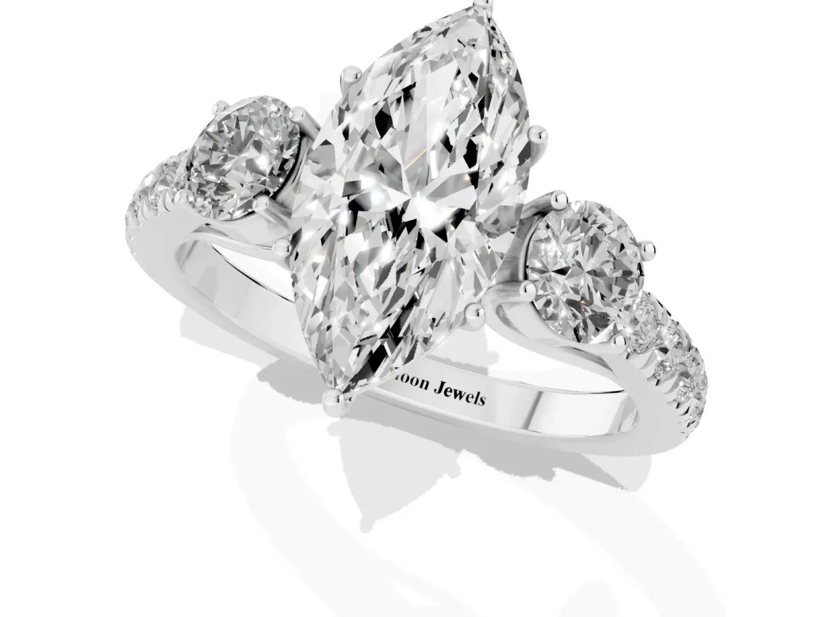 Marquise Cut Cut Diamond Three-Stone Ring with Round Side Stones and Pavé Band Silver