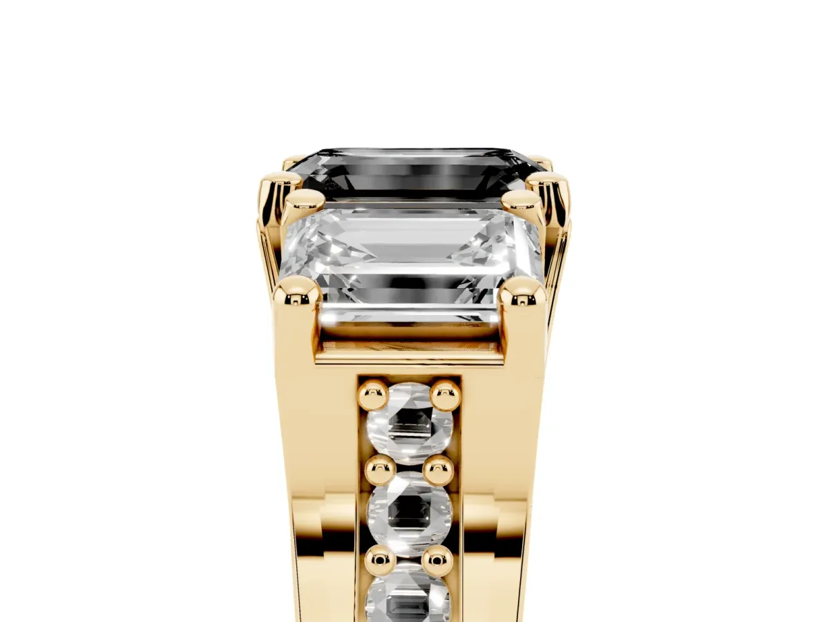 Fancy Black Emerald Cut Diamond Three-Stone Ring with Channel Set Band and Four-Prong Setting Yellow gold