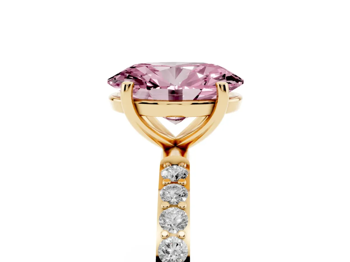 Fancy Pink Oval Cut Diamond Solitaire Ring with Round Pavé Shoulders and Prong Setting Yellow gold