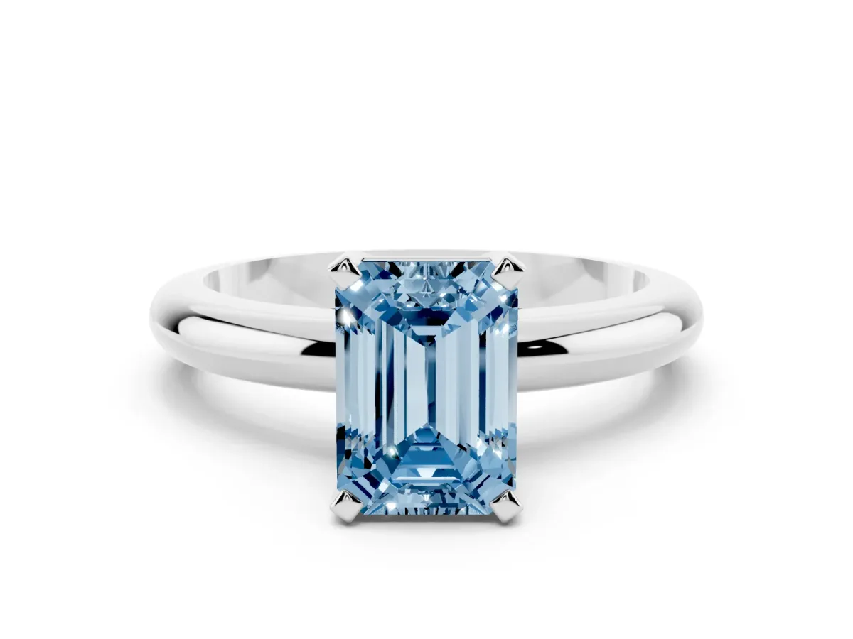 Fancy Blue Emerald Cut Diamond Solitaire Engagement Ring with Round Band and Four-Prong Setting Silver