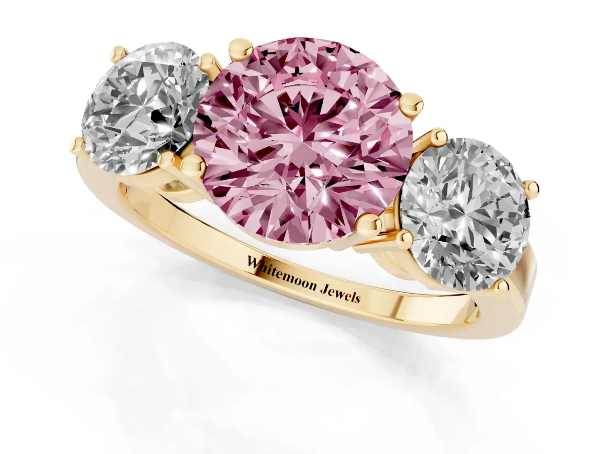 Fancy Pink Three-Stone Round Cut Cut Diamond Engagement Ring with Flat Band and Four-Prong Setting Yellow gold