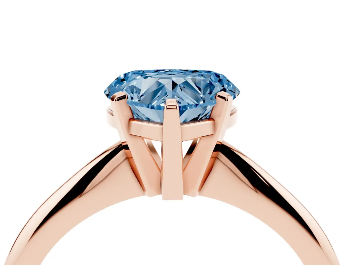 Fancy Blue Heart Cut Cut Solitaire Ring with Four-Prong Setting on a Classic Band Rose gold