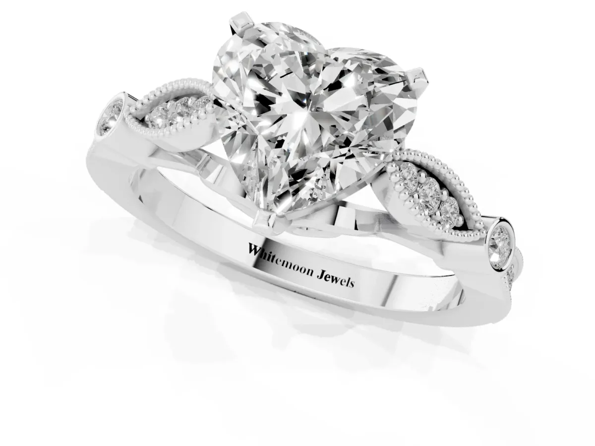 Heart Cut Cut Diamond with Milgrain Marquise and Bezel Accents on a Solitaire Band with Prong Setting Platinum