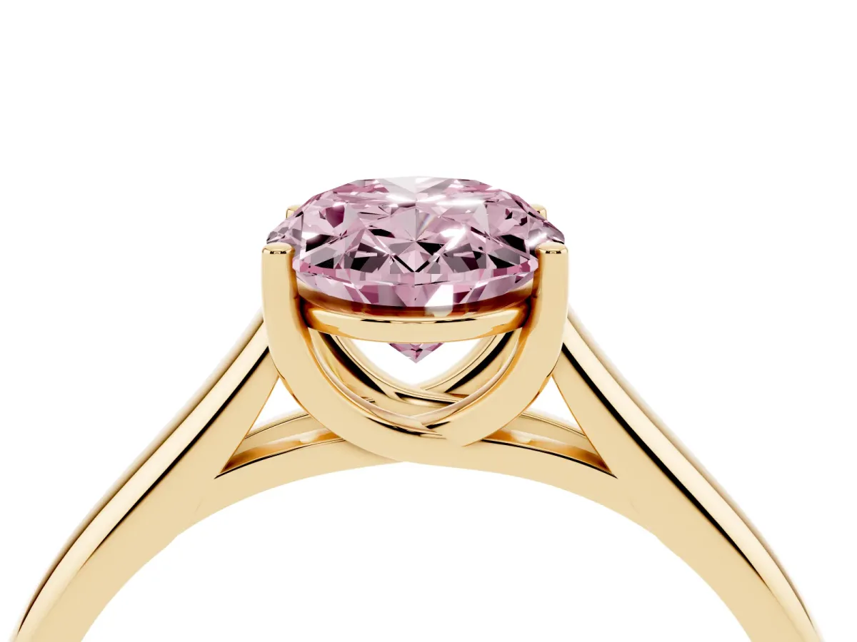Fancy Pink Oval Cut Solitaire Engagement Ring with Tapered Band and Four-Prong Setting Yellow gold