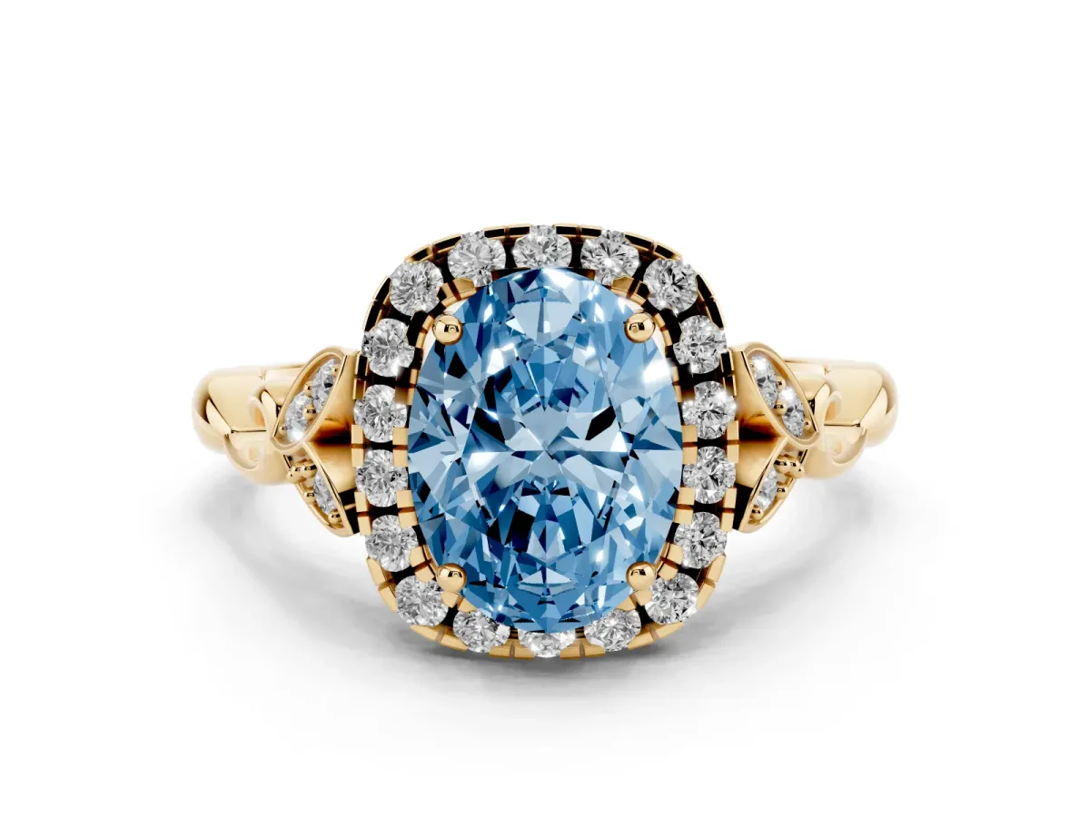 Fancy Blue Oval Cut Halo Diamond Engagement Ring with Vintage-Inspired Band and Four-Prong Setting Yellow gold